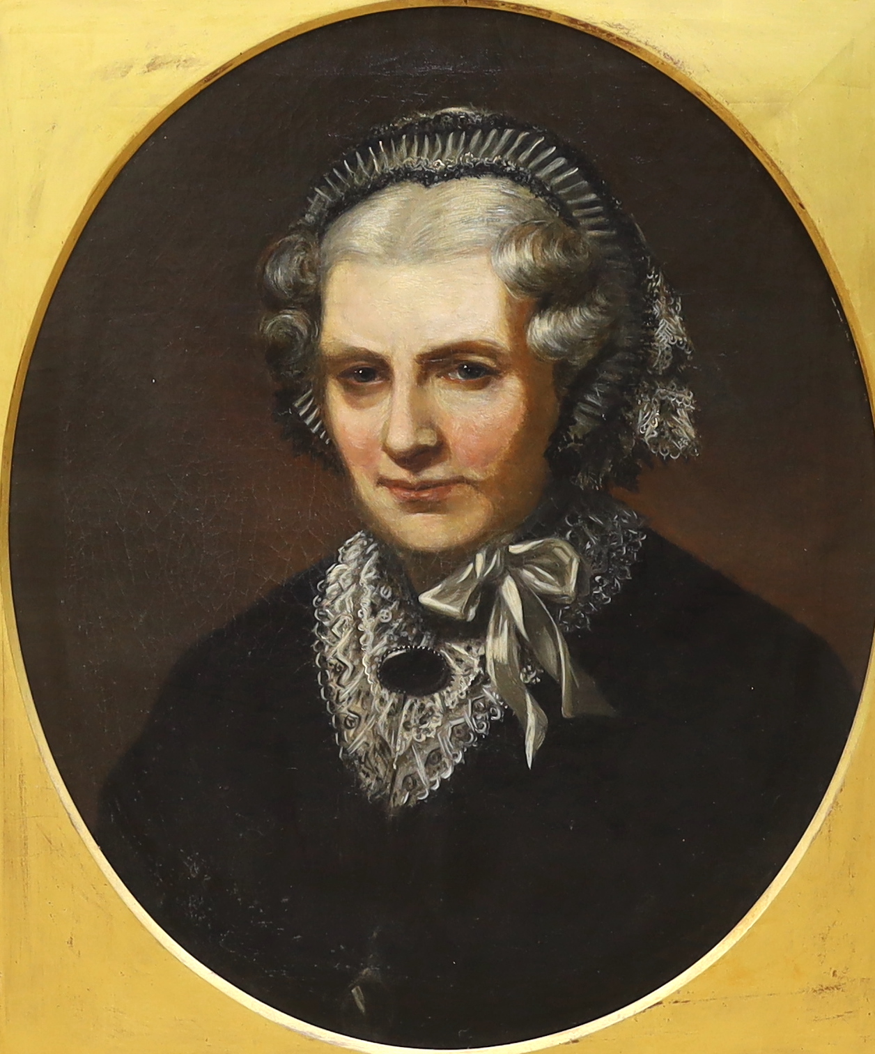 Victorian School, oval oil on canvas, Portrait of an elderly lady wearing mourning dress, 57 x 47cm